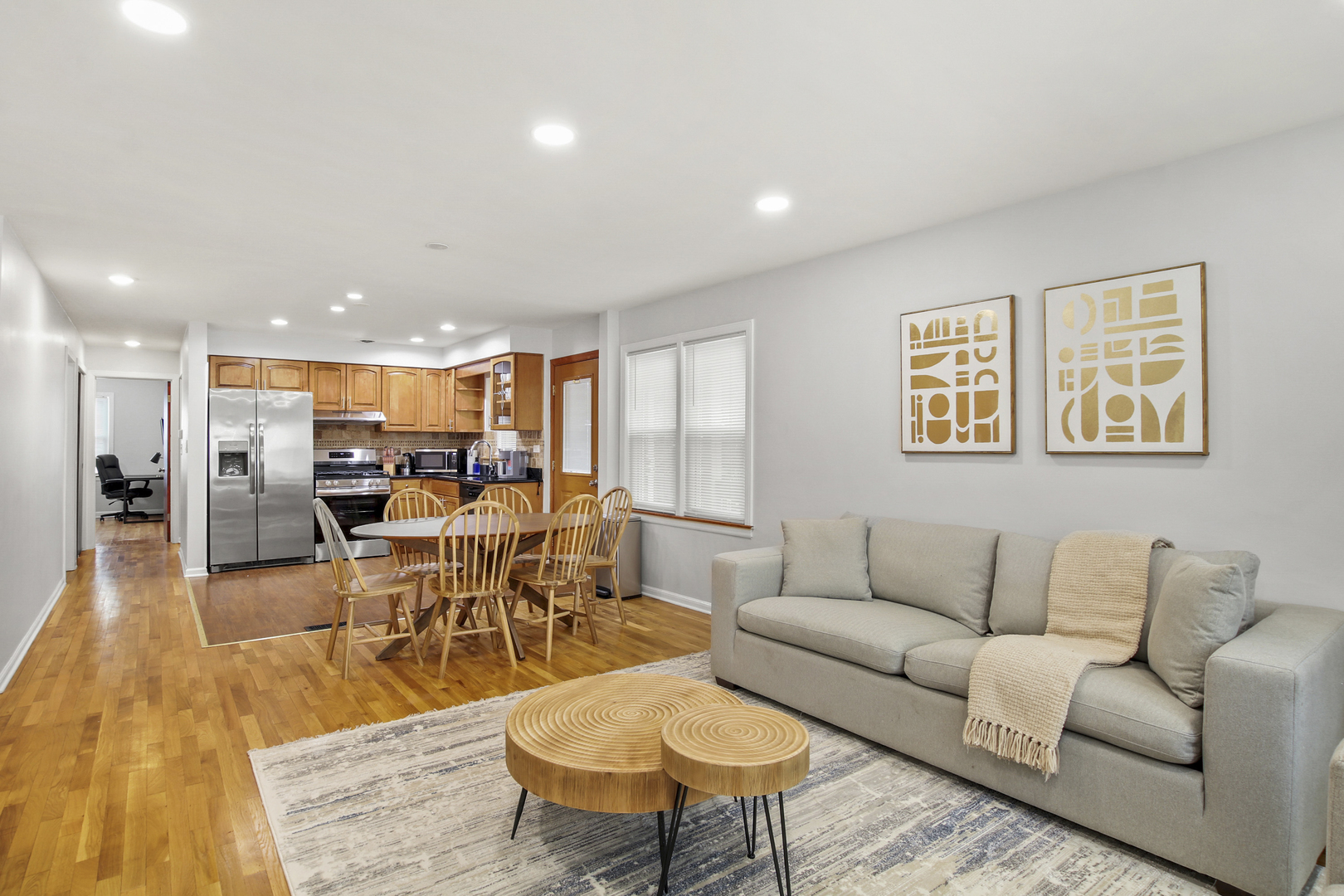 236 Callan Avenue, Unit 2 Evanston, IL 60202 - Photo 6 of 14 a living room with furniture and wooden floor