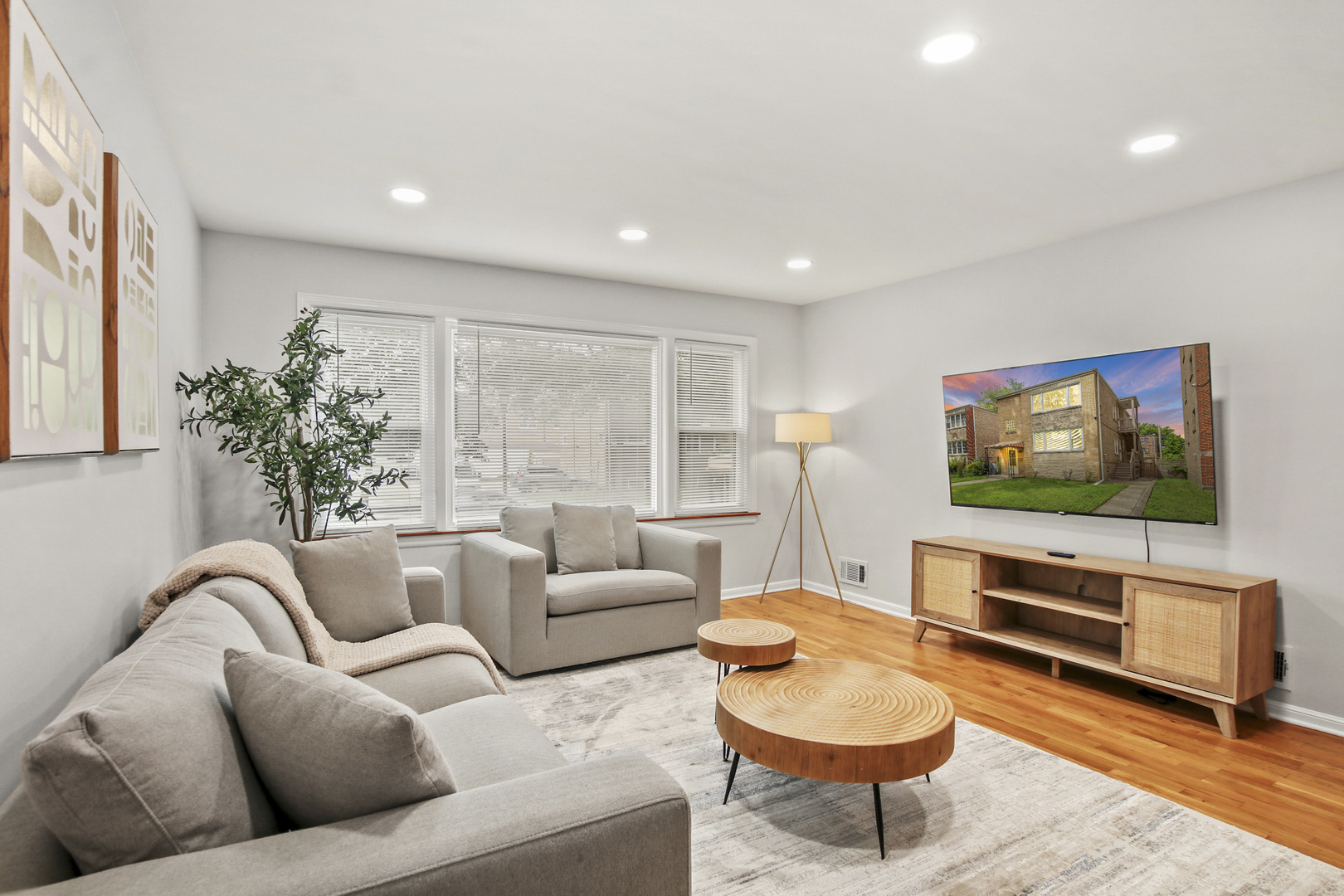 236 Callan Avenue, Unit 2 Evanston, IL 60202 - Photo 7 of 14 a living room with furniture and a flat screen tv