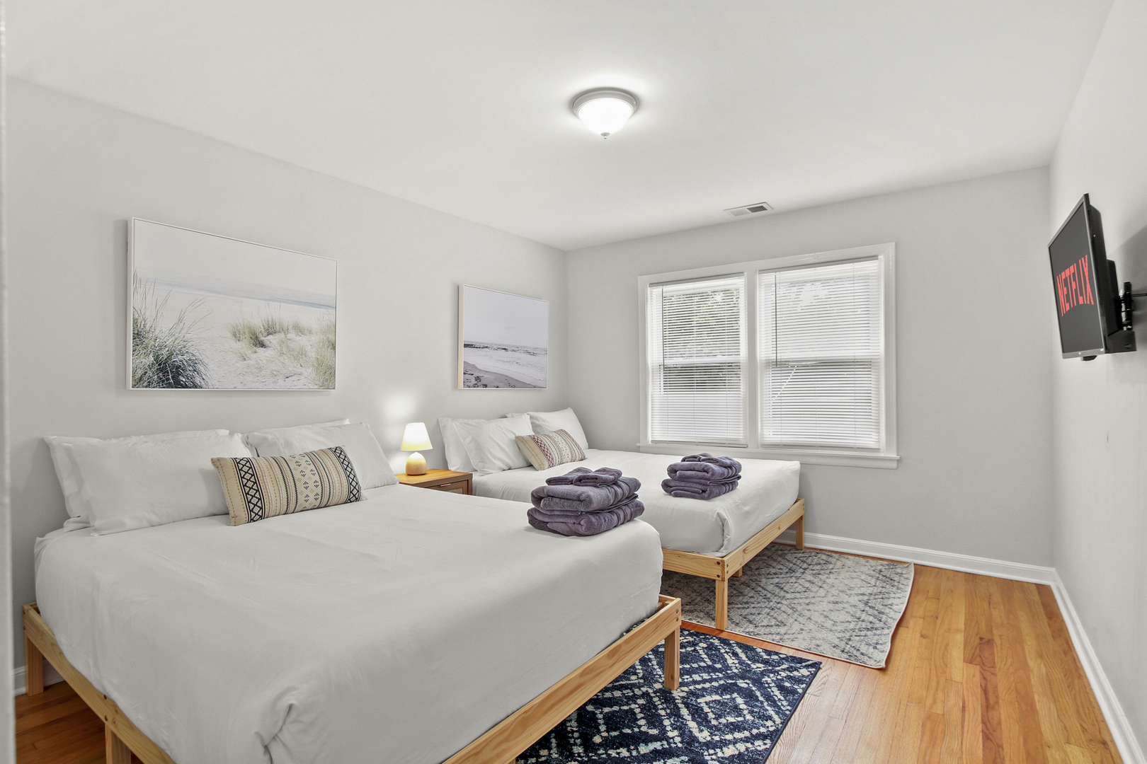 236 Callan Avenue, Unit 2 Evanston, IL 60202 - Photo 9 of 14 a bedroom with a bed and balcony