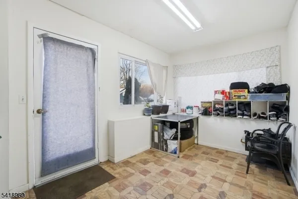 a room with furniture and a window