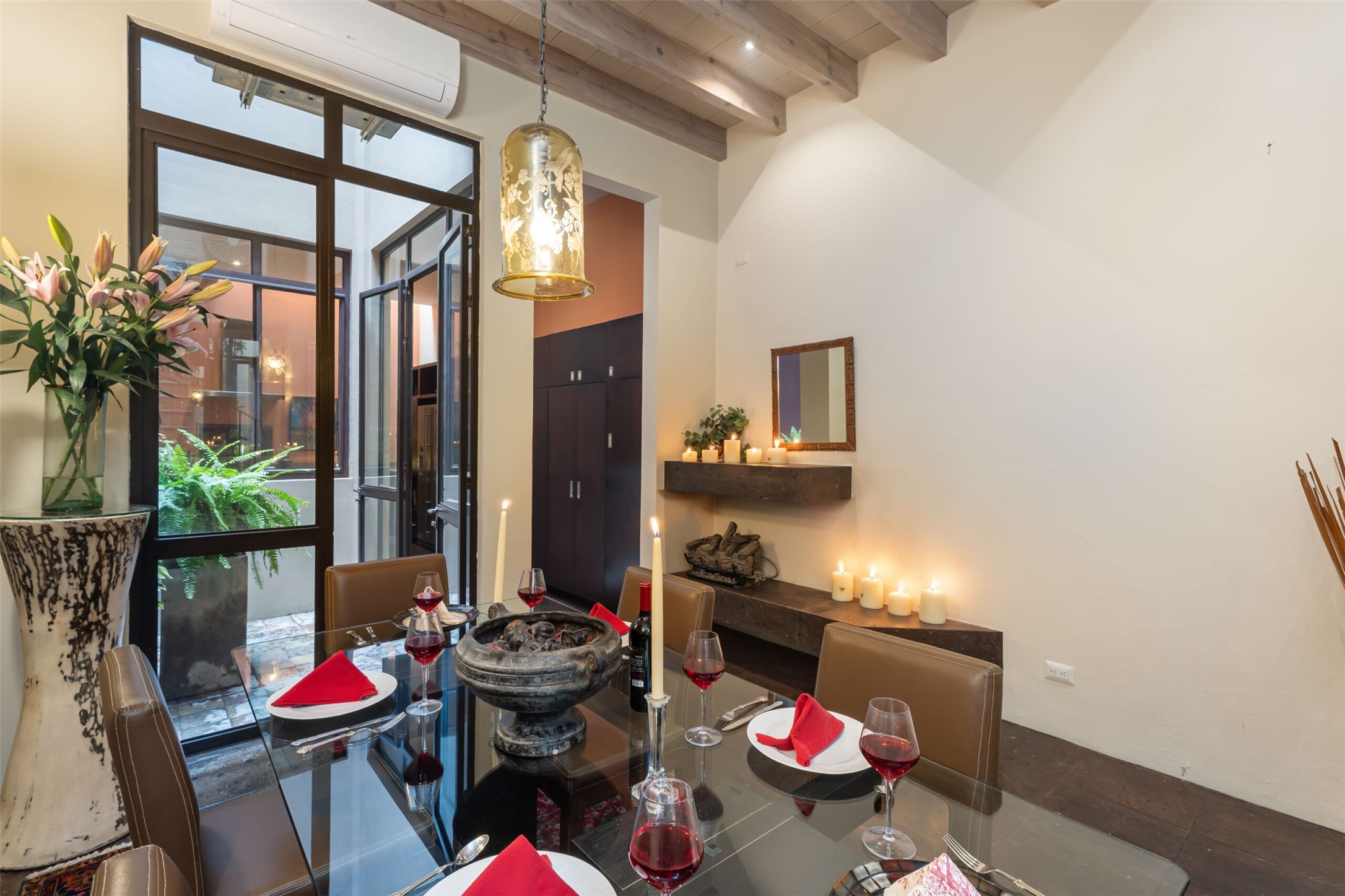 35 Quebrada undefined, undefined 00000 - Photo 3 of 41 The formal dining room fronts a second smaller courtyard that separates it from a spacious skylit kitchen