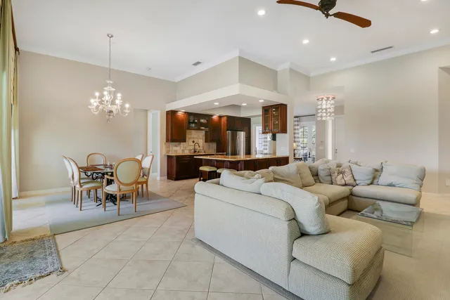 a kitchen with stainless steel appliances granite countertop a stove microwave and sink