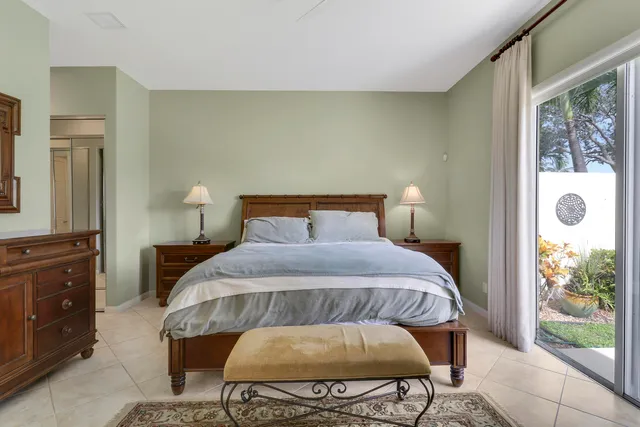 a front view of a house with a yard and porch