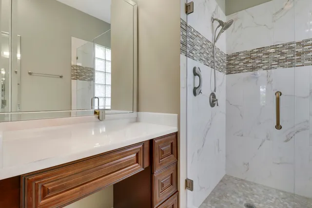 a view of a swimming pool and lounge chair