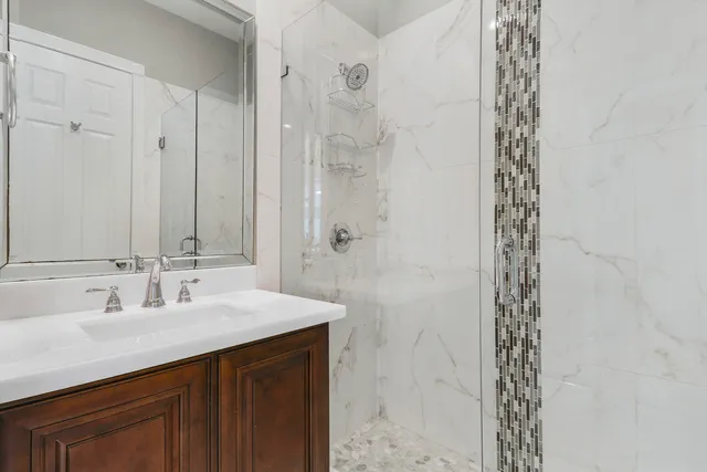 a view of a park with a slide and a barbeque