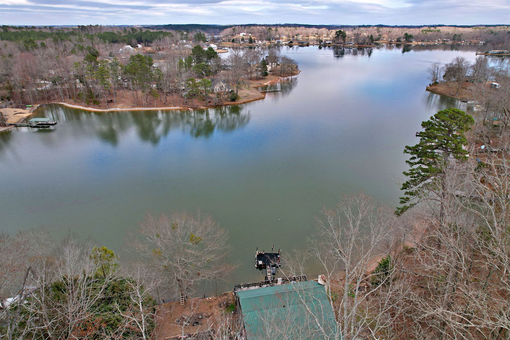 41 3rd Avenue Iva, SC 29655 - Photo 11 of 31 This serene lakefront property offers tranquil views and a private dock for aquatic adventures.