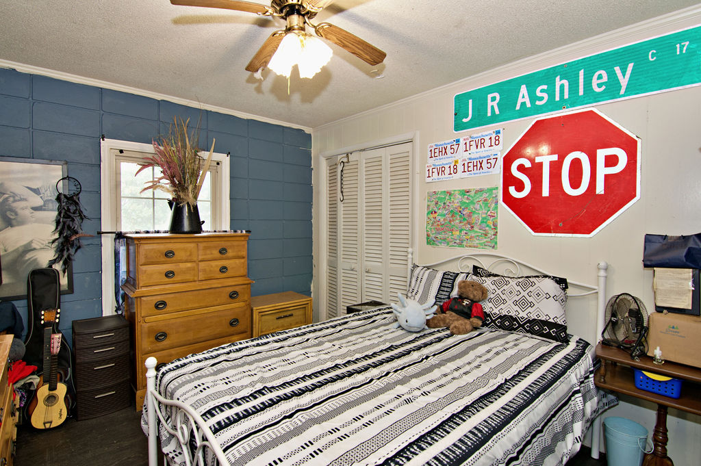 41 3rd Avenue Iva, SC 29655 - Photo 15 of 31 This cozy bedroom features a ceiling fan, providing comfort and style.