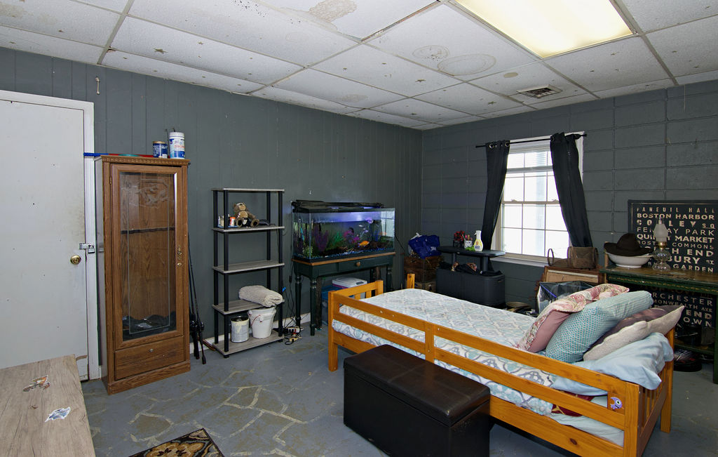 41 3rd Avenue Iva, SC 29655 - Photo 20 of 31 This versatile room features durable flooring and ample natural light, ideal for a flexible living space.