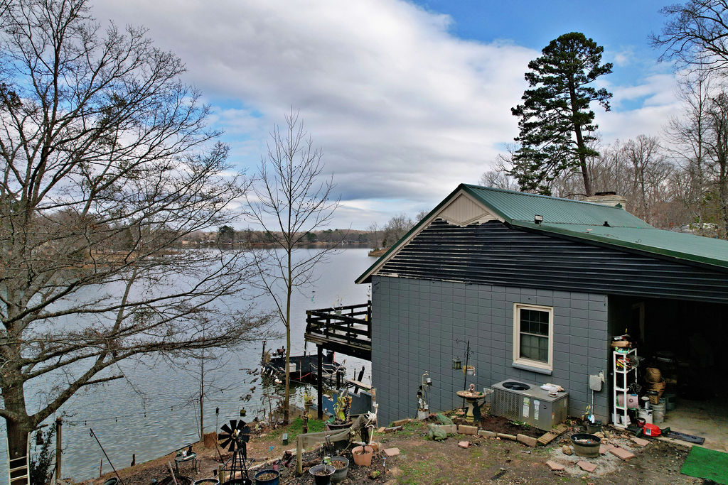41 3rd Avenue Iva, SC 29655 - Photo 26 of 31 This charming lakeside dwelling offers serene water views from a private dock.
