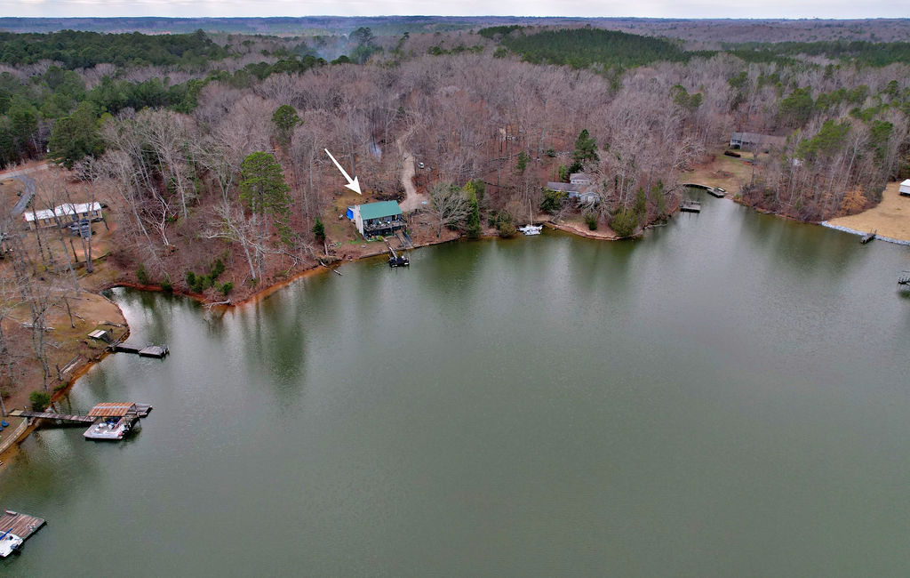 41 3rd Avenue Iva, SC 29655 - Photo 29 of 31 This serene lakefront property offers tranquil waterside living with private boat access.