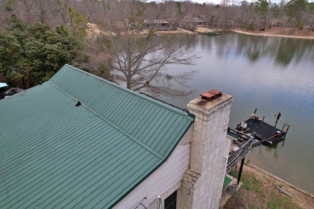 41 3rd Avenue Iva, SC 29655 - Photo 30 of 31 This scenic waterfront property features a durable metal roof and a private dock.