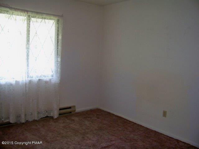 259 Devils Hole Road Cresco, PA 18326 - Photo 11 of 20 an empty room with a window