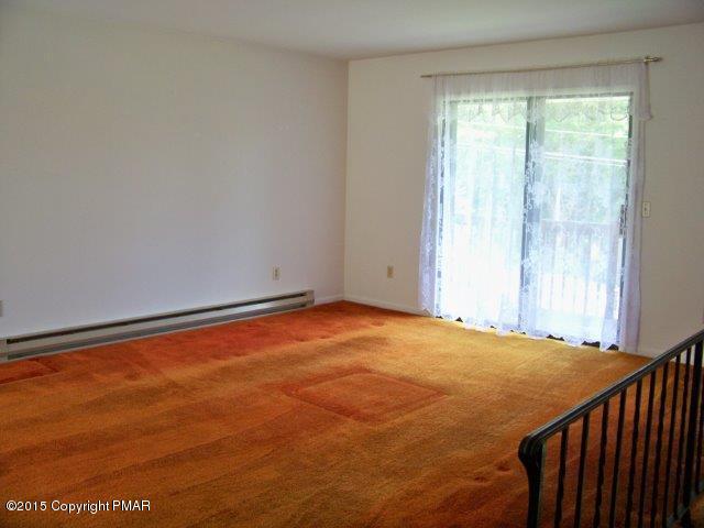 259 Devils Hole Road Cresco, PA 18326 - Photo 4 of 20 a view of an empty room with a window