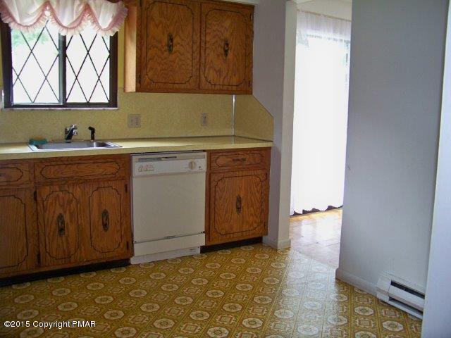 259 Devils Hole Road Cresco, PA 18326 - Photo 8 of 20 a bathroom with a sink and a mirror