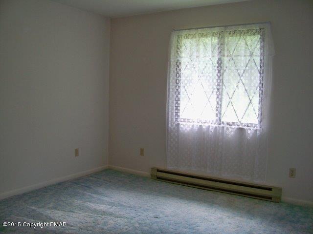 259 Devils Hole Road Cresco, PA 18326 - Photo 9 of 20 an empty room with a window