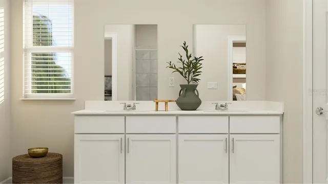 a bathroom with a sink and mirror