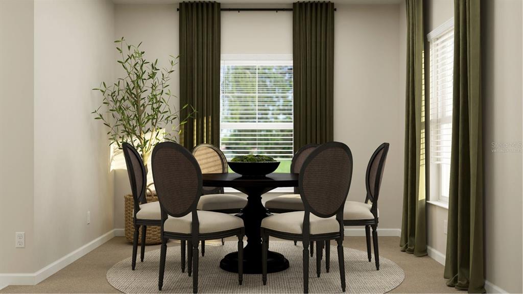 6072 Zen Way Clermont, FL 34714 - Photo 3 of 21 a view of a dining room with furniture and window