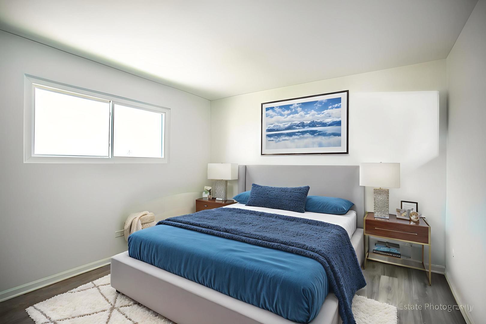 7345 West 85th Place, Unit 3A Bridgeview, IL 60455 - Photo 15 of 21 a bedroom with a bed and a painting on the wall