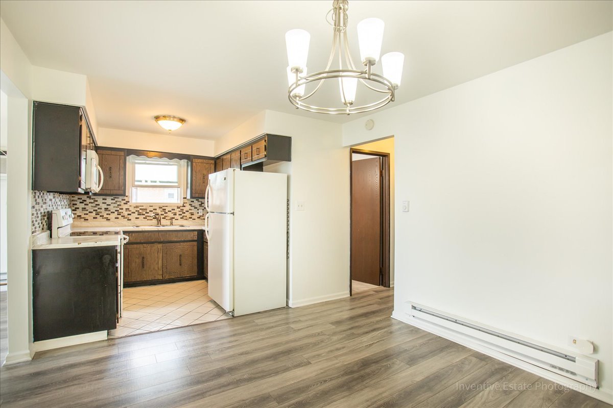 7345 West 85th Place, Unit 3A Bridgeview, IL 60455 - Photo 7 of 21 a kitchen with stainless steel appliances a refrigerator and microwave