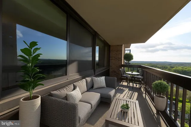 a view of balcony with furniture