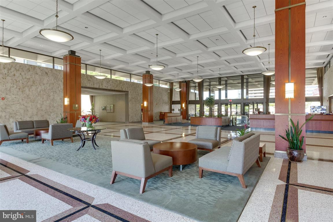 5501 Seminary Road, Unit 1113S Falls Church, VA 22041 - Photo 39 of 43 a living room with lots of furniture and a table