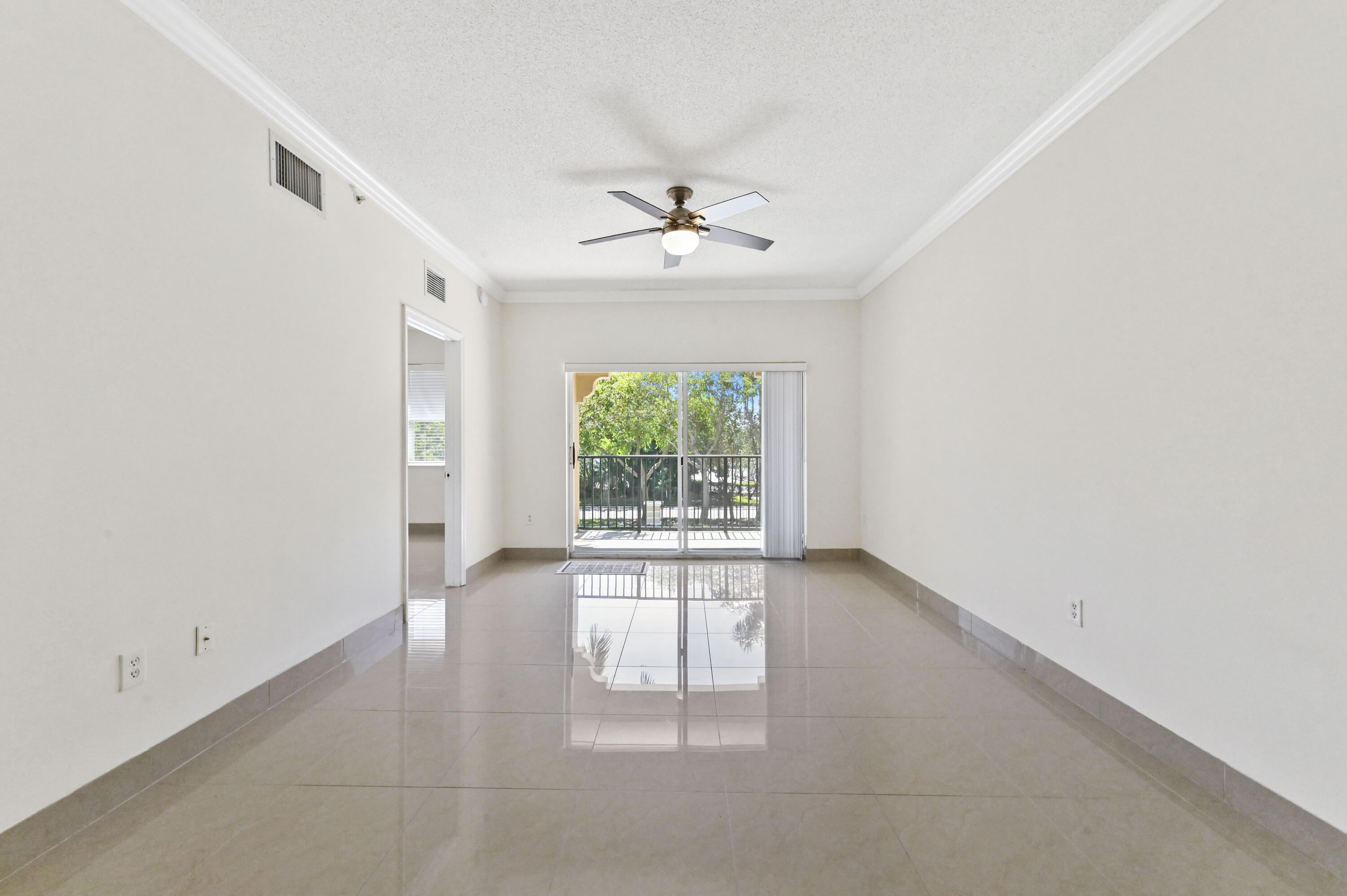6020 West Sample Road, Unit 204 Coral Springs, FL 33067 - Photo 5 of 25 07 Livingroom 01