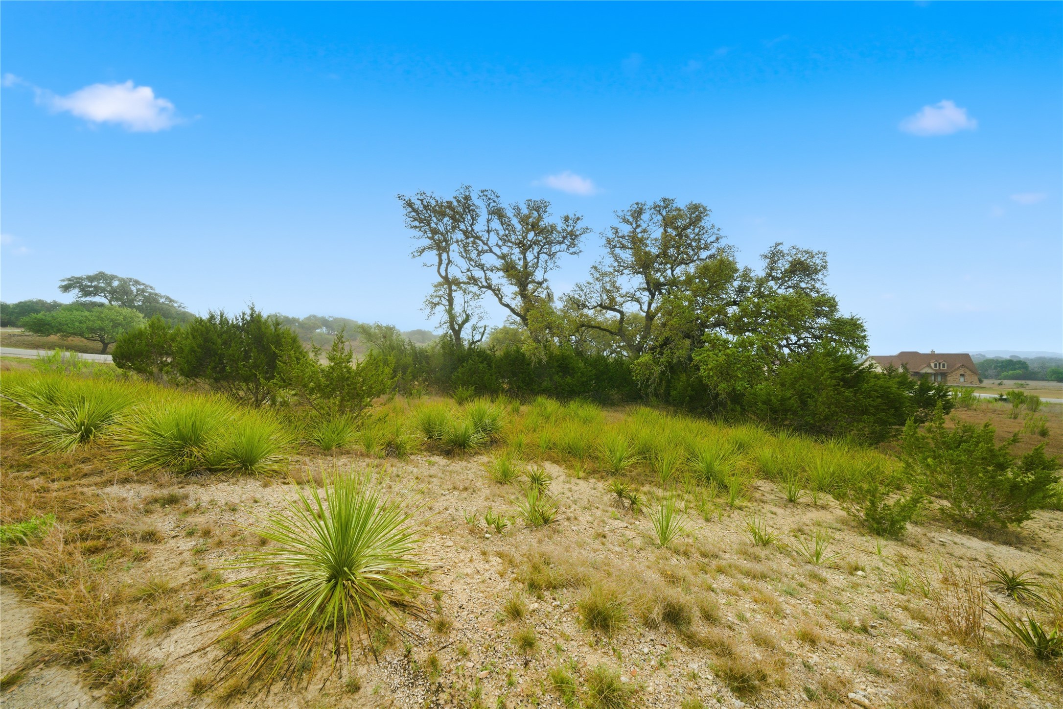 Tbd Highgate Drive Bandera, TX 78003 - Photo 14 of 23 a view of a lake with a yard