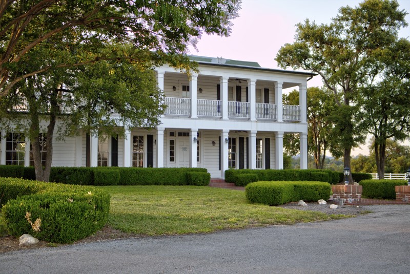 Tbd Highgate Drive Bandera, TX 78003 - Photo 23 of 23 a front view of a house with garden and trees