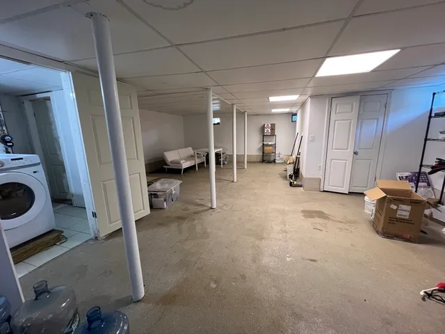 a view of a livingroom with furniture and storage