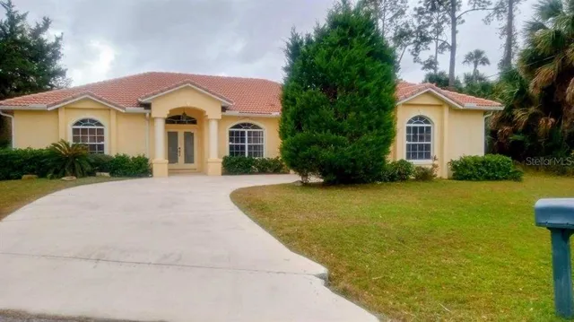a view of a balcony with chair