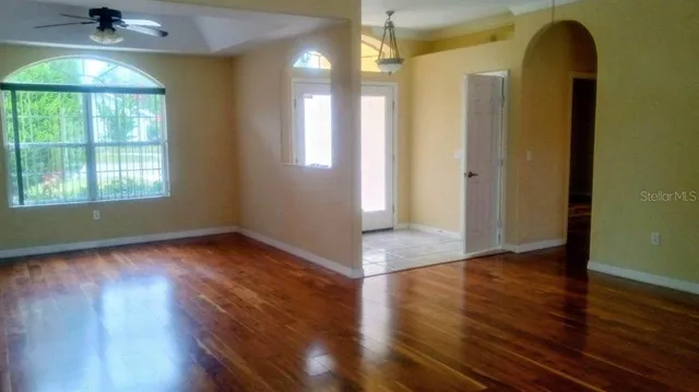 a kitchen with stainless steel appliances a stove a sink and a microwave