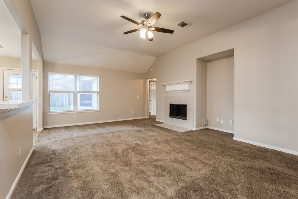 3219 Candlepine Drive Spring, TX 77388 - Photo 4 of 16 a view of empty room with a fireplace