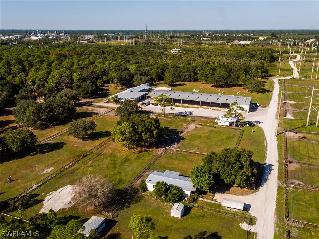 11331 Long Road Fort Myers, FL 33905 - Photo 3 of 24 an aerial view of residential houses with outdoor space