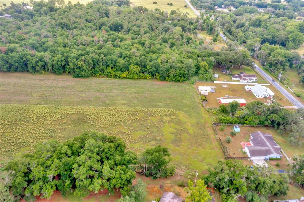 Fort King Rd Road Dade City, FL 33525 - Photo 11 of 23 a view of a lake with a yard