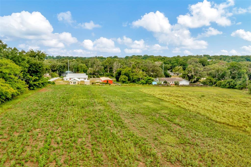 Fort King Rd Road Dade City, FL 33525 - Photo 14 of 23 a view of a lake with a big yard