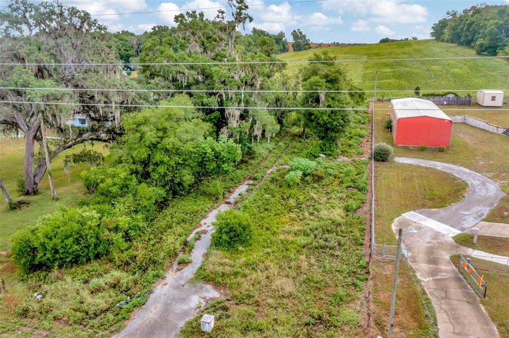 Fort King Rd Road Dade City, FL 33525 - Photo 5 of 23 a view of a garden with an outdoor space