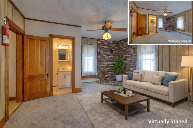 a living room with furniture and a fireplace