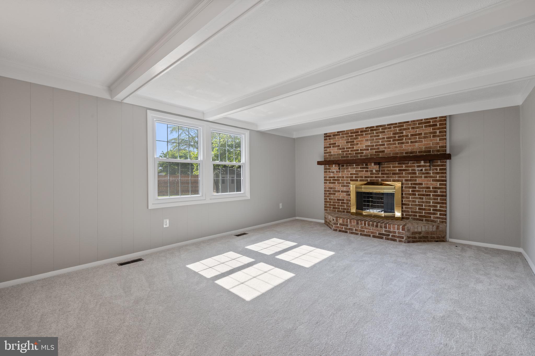 22000 Goshen School Road Gaithersburg, MD 20882 - Photo 15 of 57 an empty room with windows fire place and fireplace