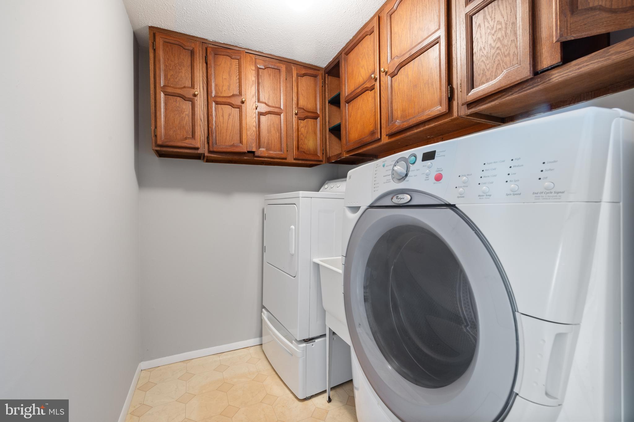22000 Goshen School Road Gaithersburg, MD 20882 - Photo 26 of 57 a utility room with dryer and washer