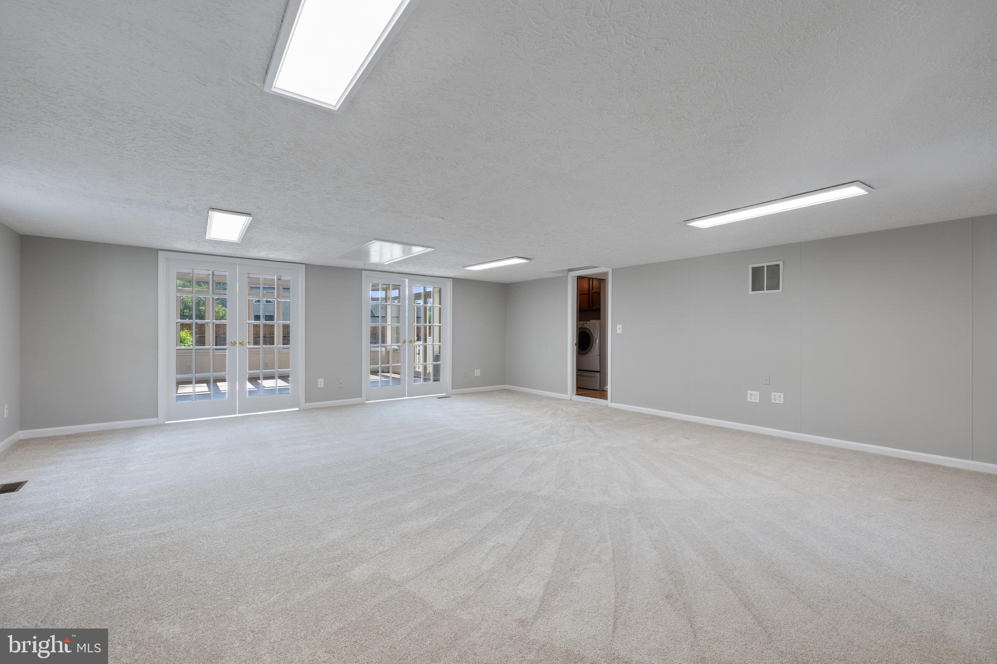 22000 Goshen School Road Gaithersburg, MD 20882 - Photo 28 of 57 a view of a livingroom with a staircase