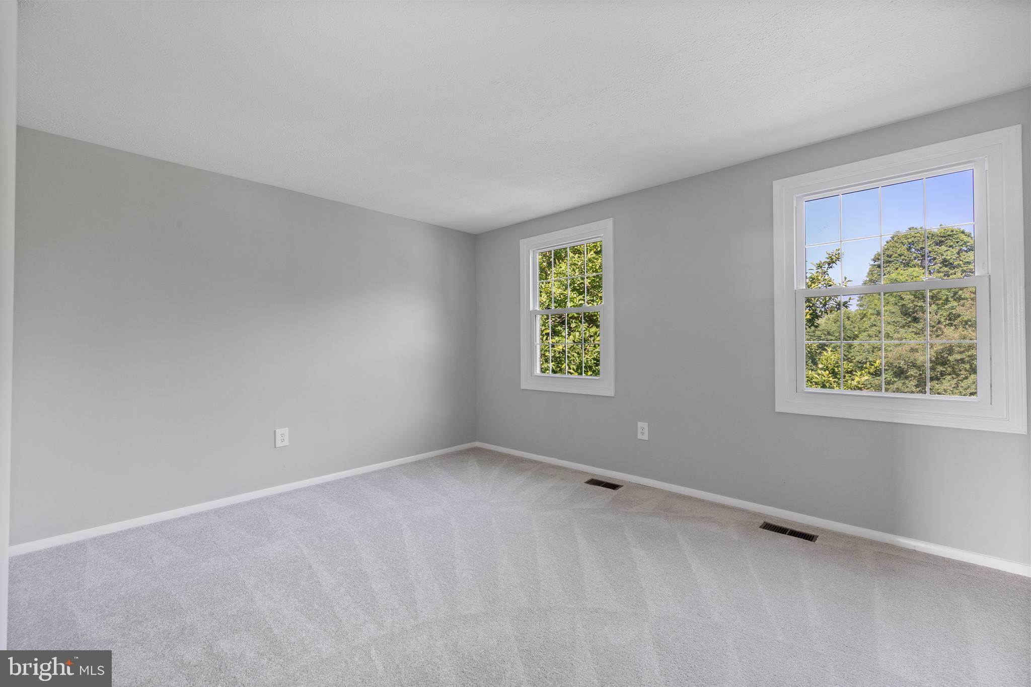 22000 Goshen School Road Gaithersburg, MD 20882 - Photo 32 of 57 an empty room with windows