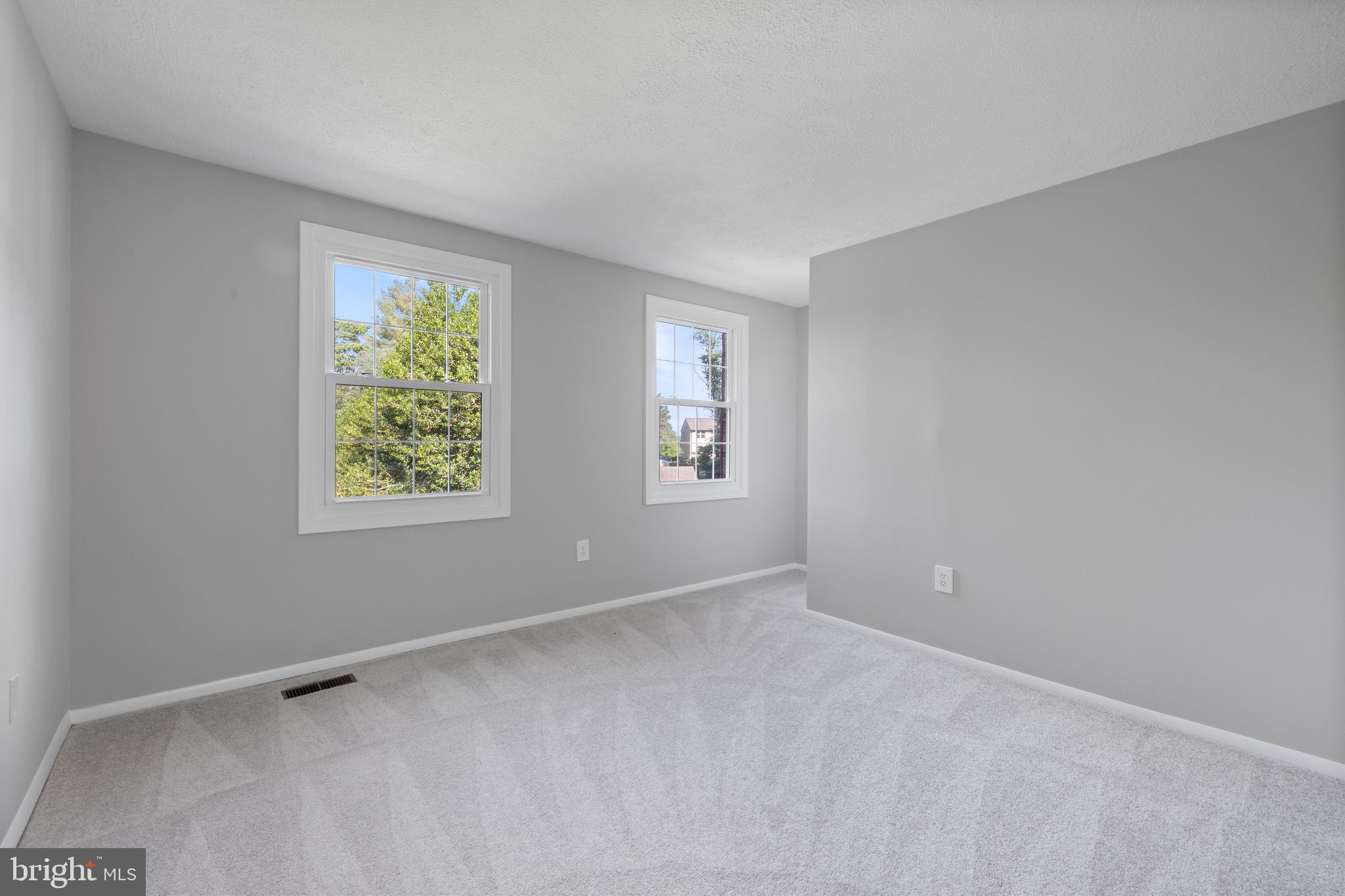 22000 Goshen School Road Gaithersburg, MD 20882 - Photo 36 of 57 an empty room with windows