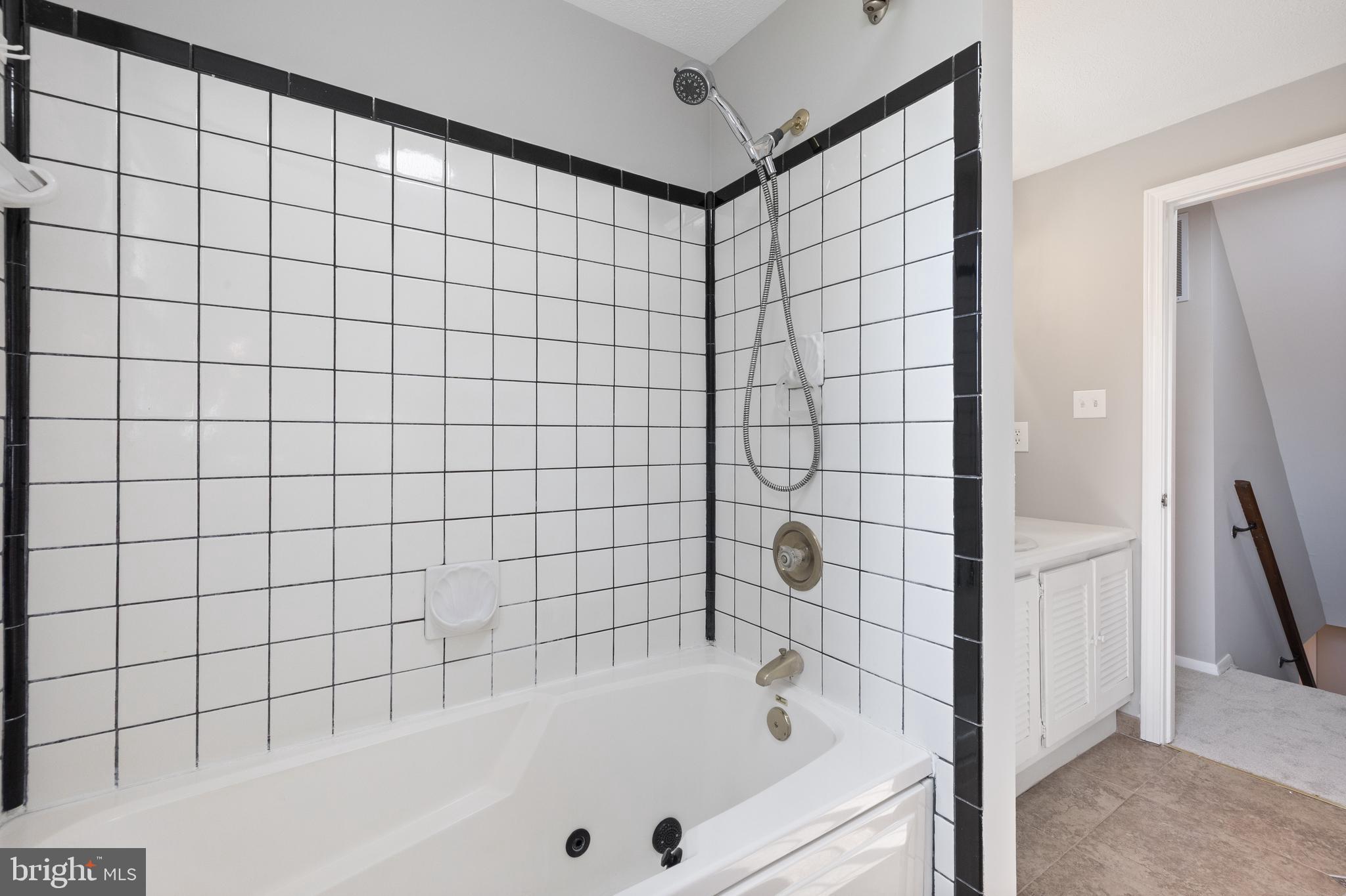 22000 Goshen School Road Gaithersburg, MD 20882 - Photo 39 of 57 a bathroom with a bathtub and shower