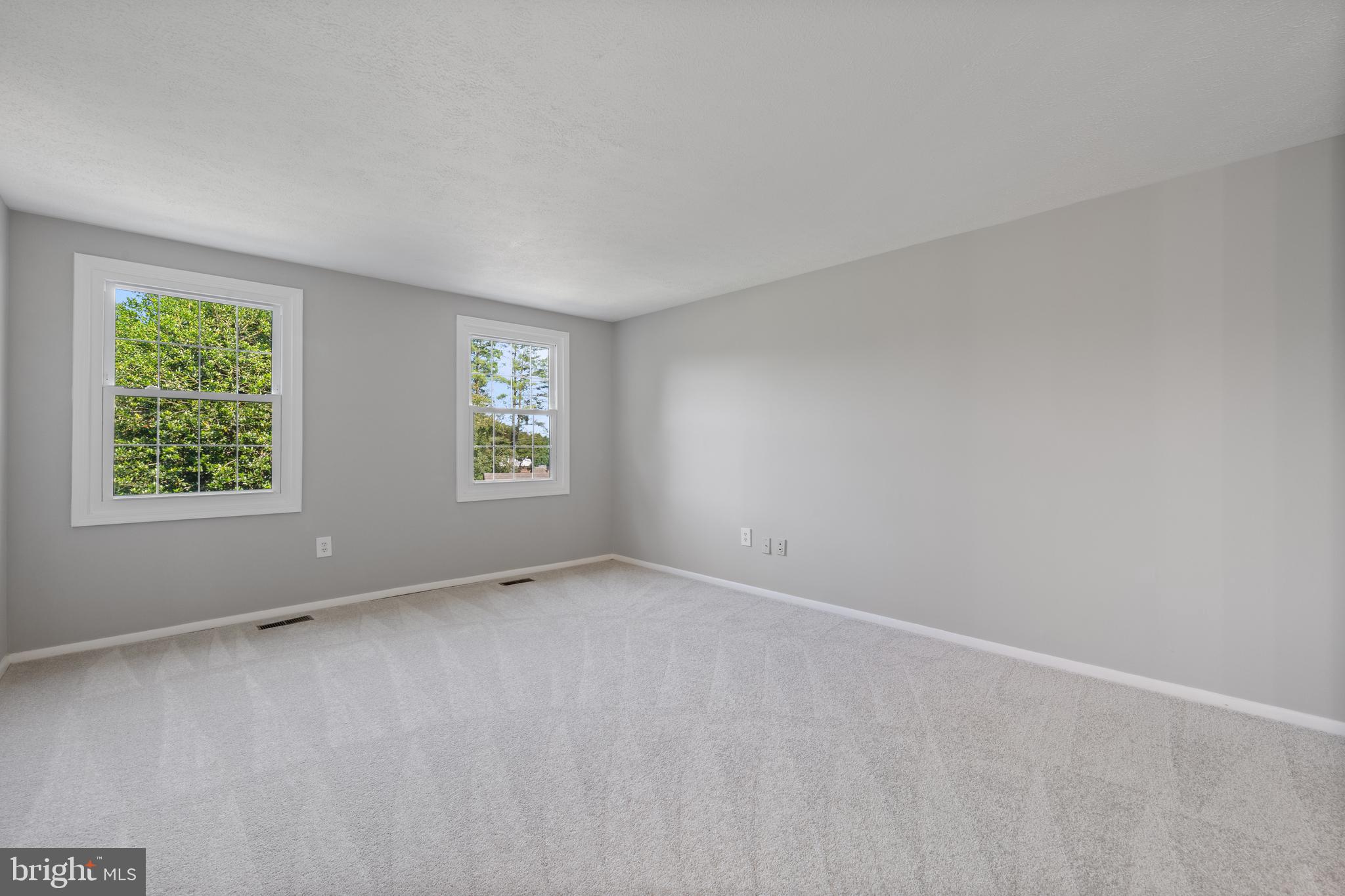 22000 Goshen School Road Gaithersburg, MD 20882 - Photo 40 of 57 an empty room with windows