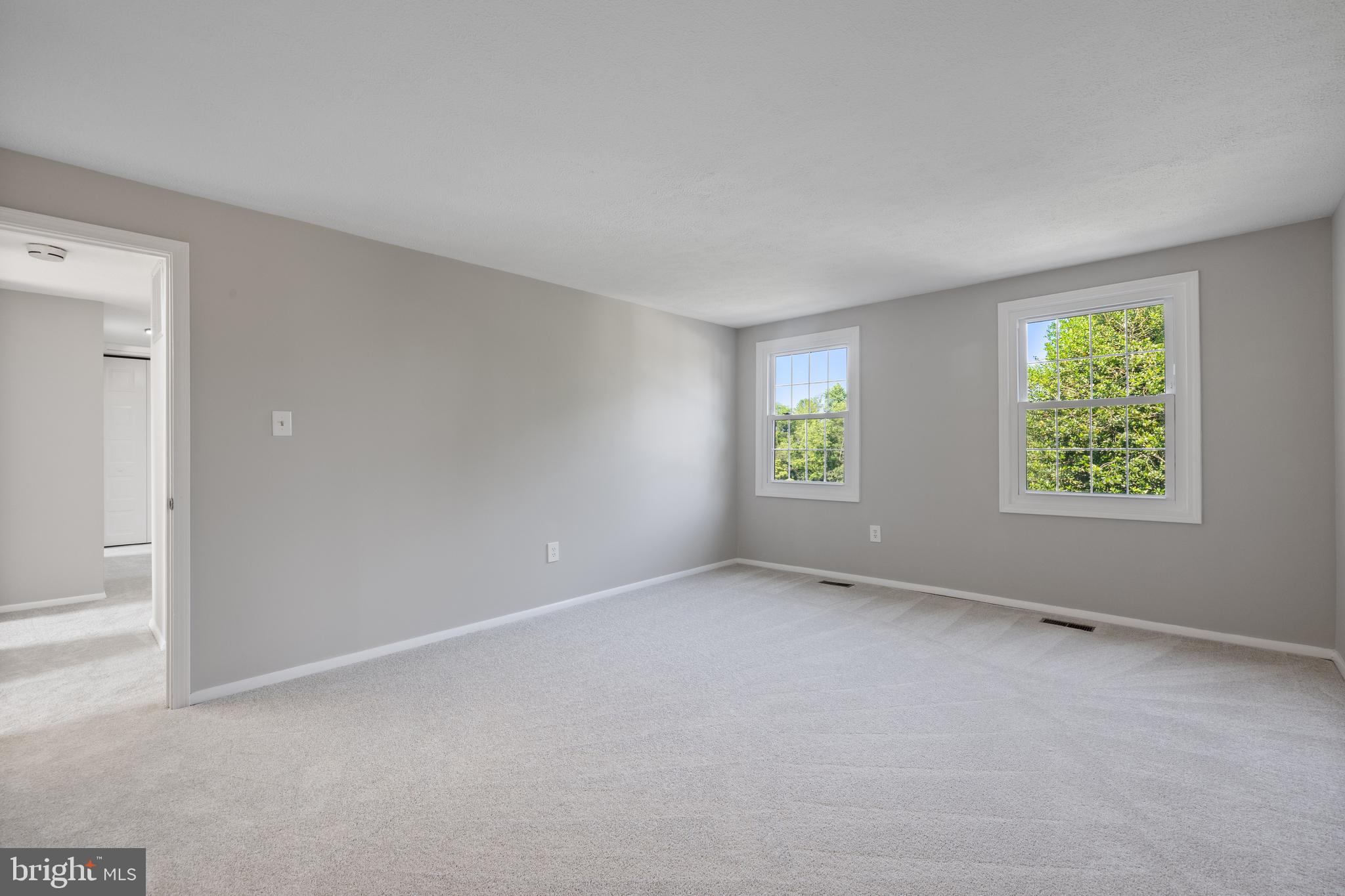 22000 Goshen School Road Gaithersburg, MD 20882 - Photo 41 of 57 an empty room with windows