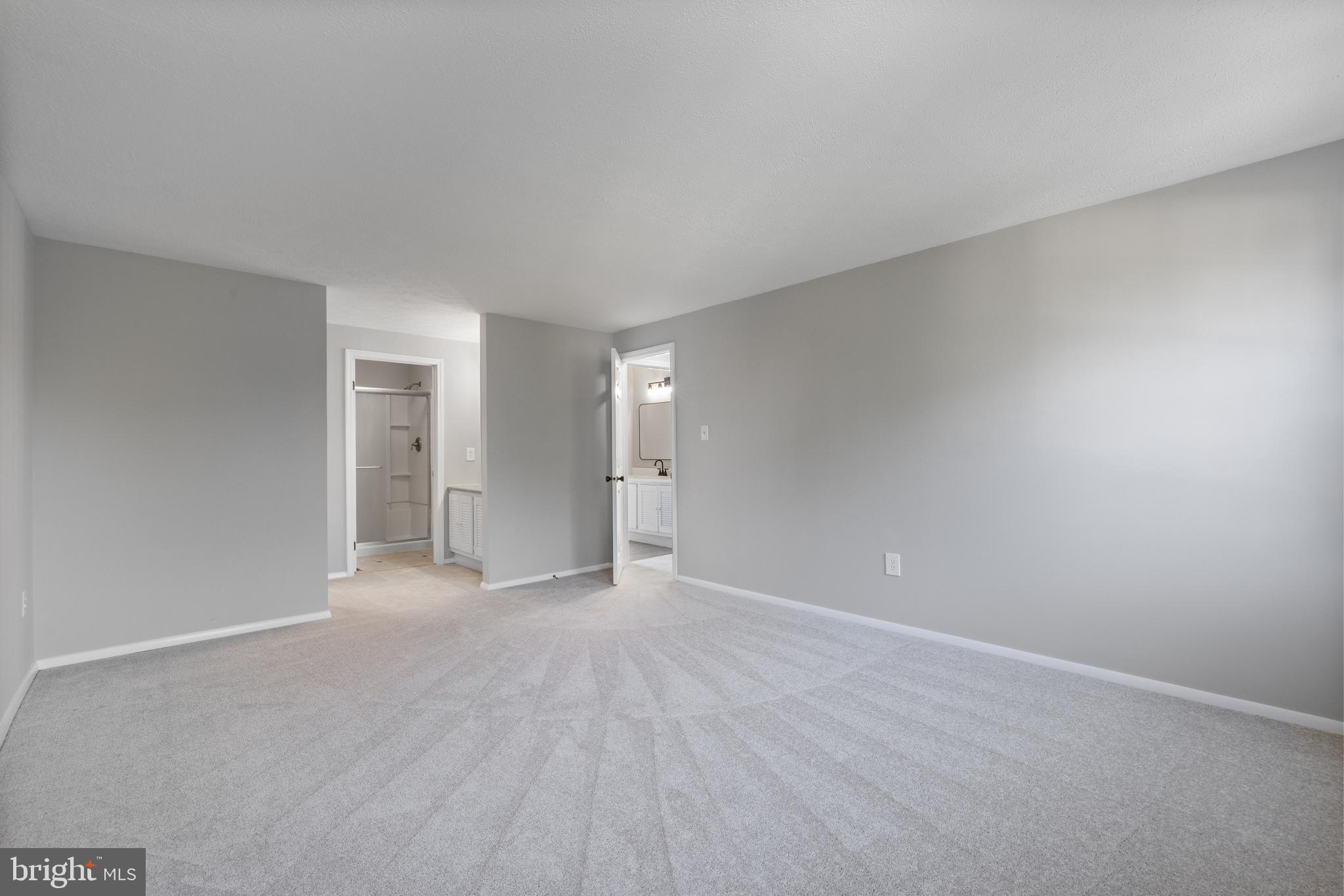 22000 Goshen School Road Gaithersburg, MD 20882 - Photo 42 of 57 a view of an empty room with closet and a window