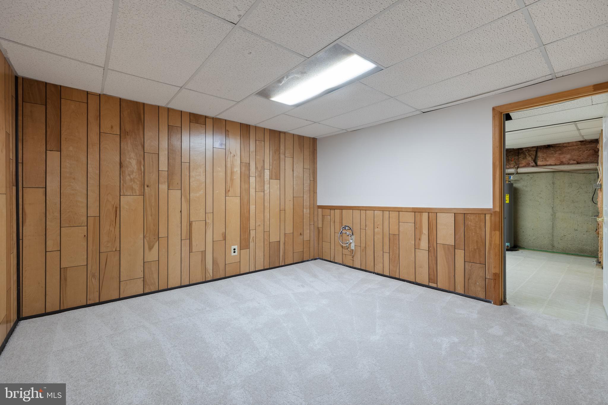 22000 Goshen School Road Gaithersburg, MD 20882 - Photo 49 of 57 an empty room with a wooden walls