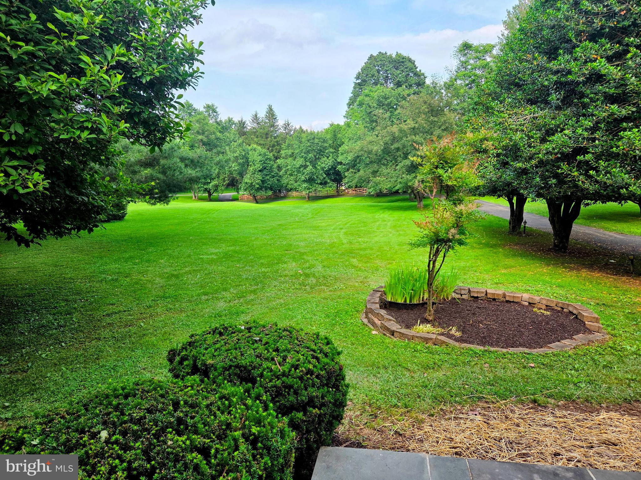 22000 Goshen School Road Gaithersburg, MD 20882 - Photo 53 of 57 a view of a garden with trees
