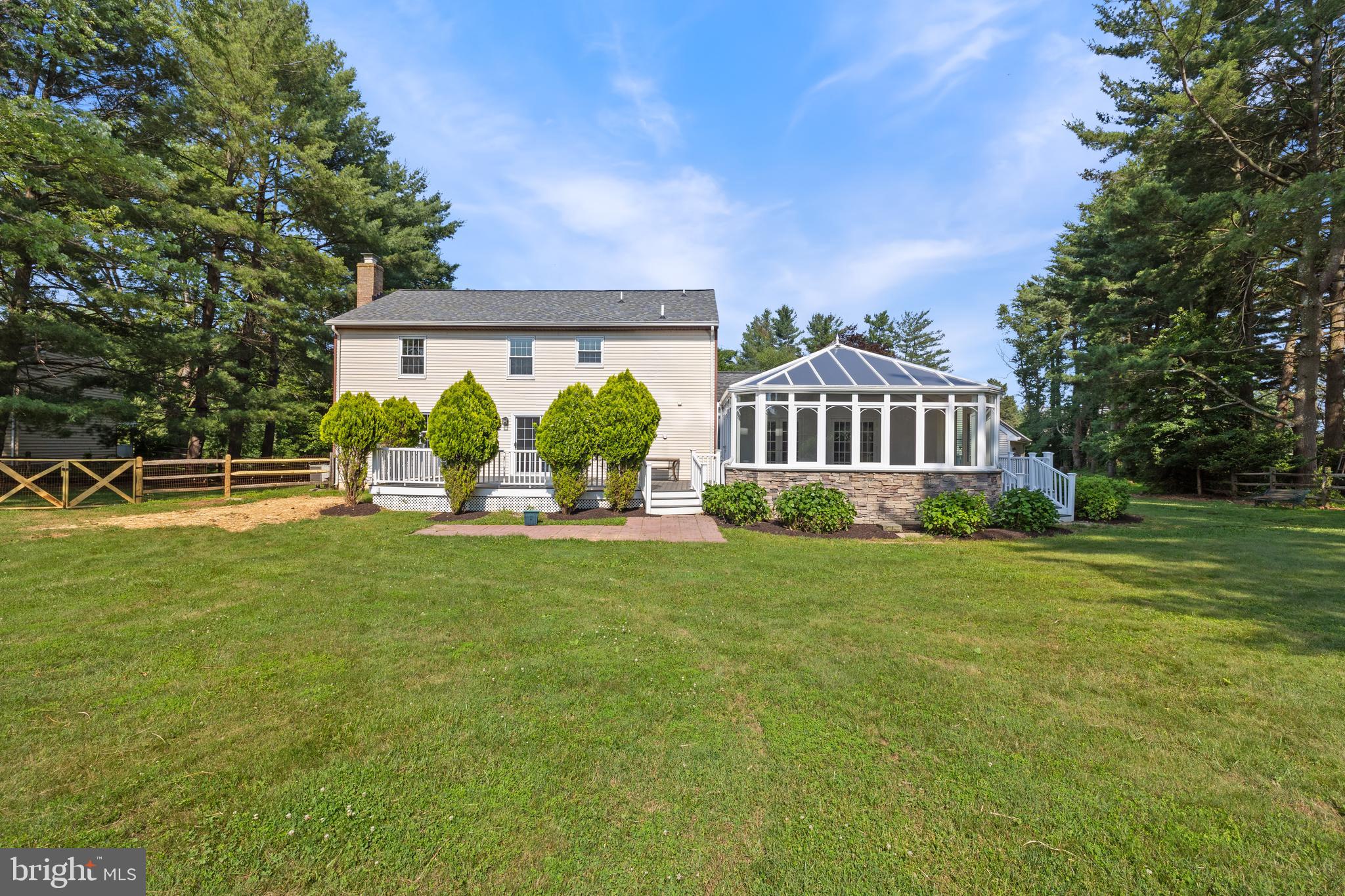 22000 Goshen School Road Gaithersburg, MD 20882 - Photo 6 of 57 a front view of a house with garden