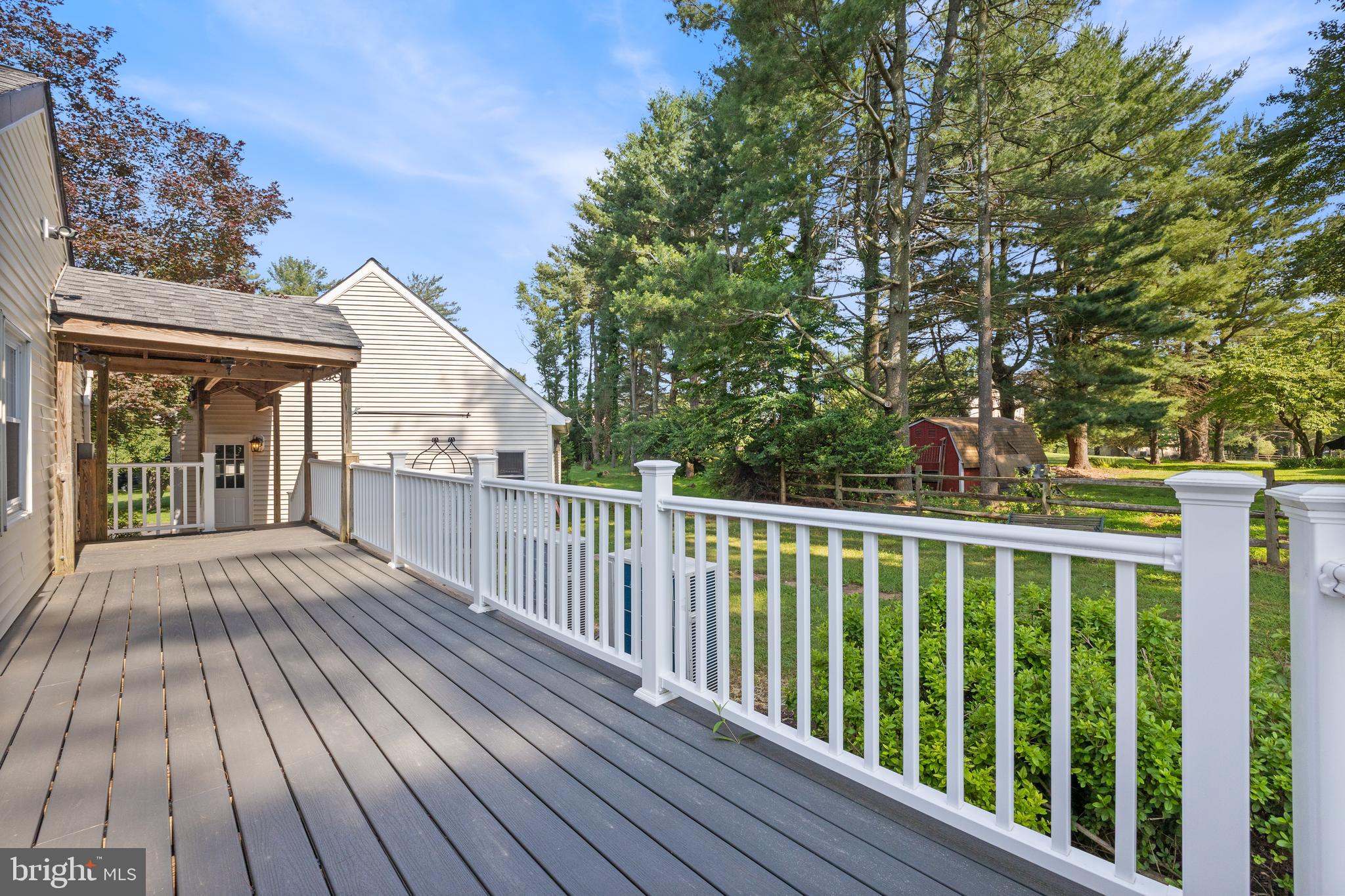 22000 Goshen School Road Gaithersburg, MD 20882 - Photo 9 of 57 a view of backyard with deck and wooden floor